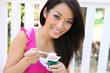 © Stephen Coburn - Pretty Asian Woman Eating Yogurt