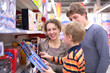 © Pavel Losevsky - Parents with son in toy`s shop