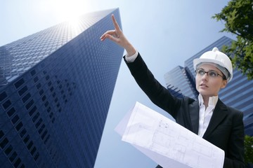 architect woman working outdoor with buildings