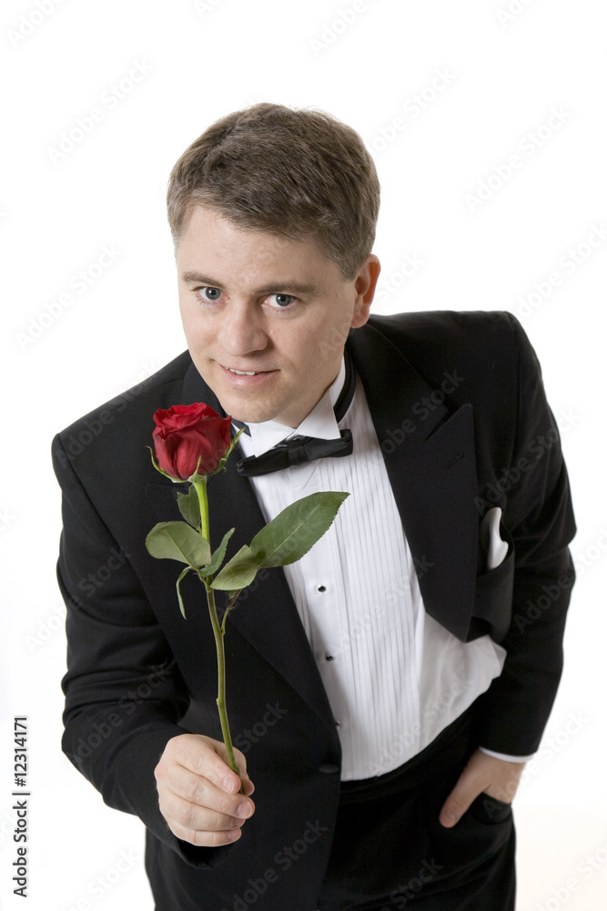 Man Holding out Rose to Camera Stock Photo