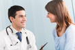 © vgstudio - Happy doctor and female patient at office