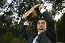 Angry Businessman Outdoor, Big Stone In Hands