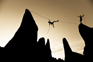 Climber on a tyrolean traverse.