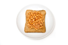 Plate Of Baked Beans On Toast, Isolated On A White Background.