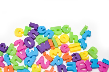 Magnetic letters isolated on a white studio background.