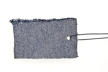 blue jeans tag with lace isolated on white