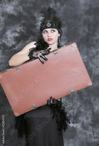 Poster portrait of retro young woman with suitcase