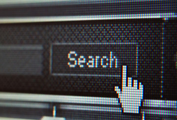 Extreme Closeup of Mouse Cursor over Search Button