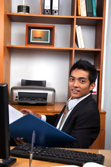 Wall Mural - Young business executive in the office