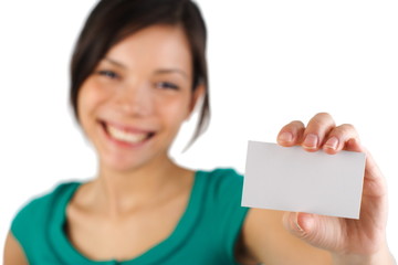 Casual business woman with blank business card