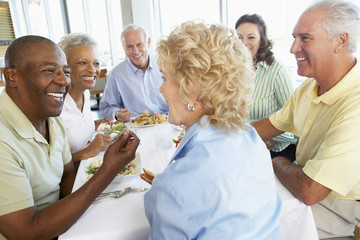 Friends Having Lunch Together At A Restaurant