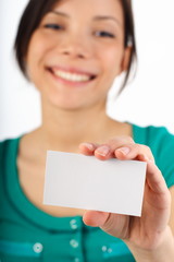 Wall Mural - Casual business woman with blank business card