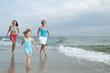© Gorilla - Happy family playing on the beach