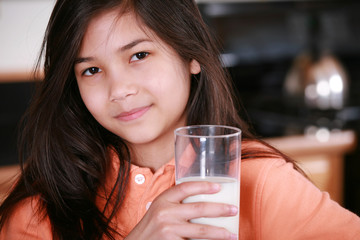 Wall Mural - Child holding glass of milk