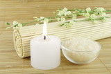 bath salt and candle on wooden background