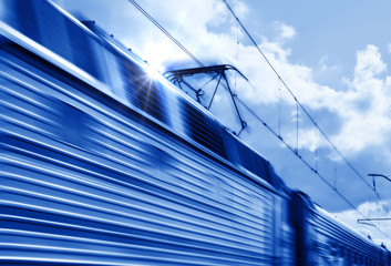 Wall Mural - Blue speed train in motion