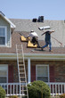 Roofers working