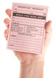 © Andy Dean - Male Hand Holding Blank Pink Message Pad