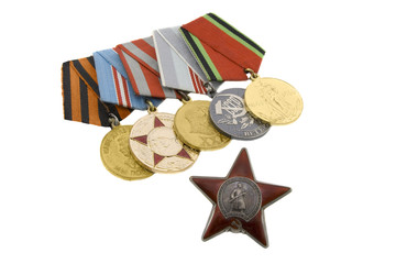 The medals of soviet heroes isolated over white background