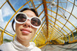 © logoboom - Wide angle portrait of a young woman in sunglasses