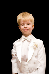 The child in a white tuxedo