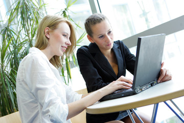 Two Girls working