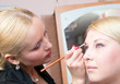 © Fanfo - putting on models eye make up