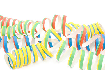 Colorful party streamers on white background