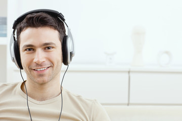 Sticker - Man listening music with headphones