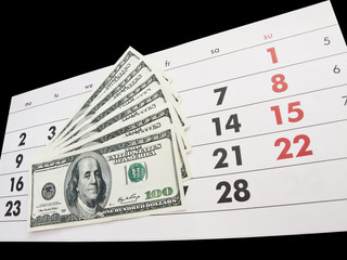 Fototapete - Calendar and dollars