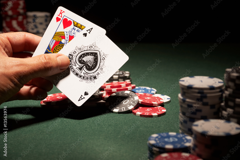Blackjack hand of cards and casino chips - obrazy, fototapety, plakaty 