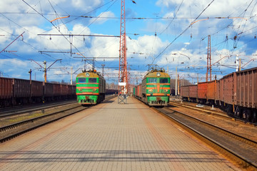 Freight trains passing station