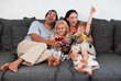 © WavebreakMediaMicro - Happy Family on Sofa Playing Video games