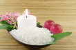 Pink flowers, candle and bath salt