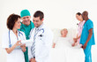 © WavebreakMediaMicro - Group of doctors with a patient