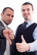 © Andreea Ardelean - Two business men, one with finger up and one down
