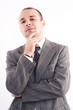 © Andreea Ardelean - Successful business man looking happy over a white background