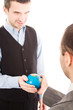 © Andreea Ardelean - Successful business maen with globe over a white background