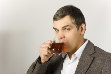 Businessman drinking tea