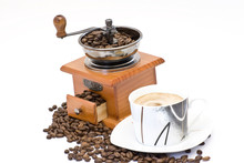 Cup Of Coffee And Coffee Grinder