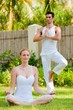 © EastWest Imaging - Couple Doing Yoga