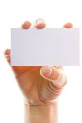 Close-up of hand with white card