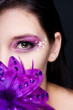 Purple make-up with stars and a purple flower