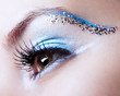 White and blue with silver sparkle make-up