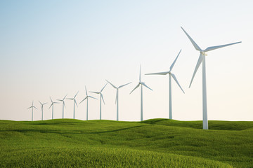 Wall Mural - wind turbines on green grass field