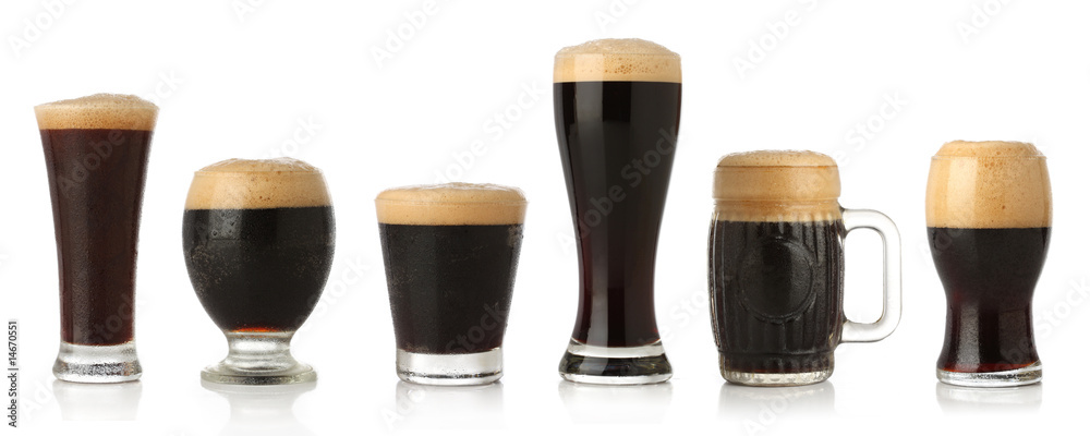 Differente glasses of stout beer, isolated on white - obrazy, fototapety, plakaty 