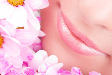 Wall Mural - Smile of young woman with flowers