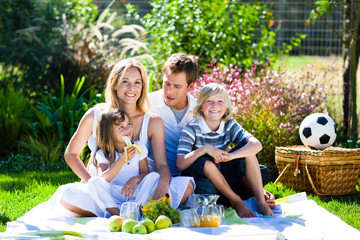 Wall Mural - Happy family having a picnic