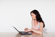 © WavebreakMediaMicro - Attractive woman using her laptop