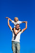 © WavebreakMediaMicro - Boy sitting on his father's shoulders